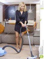 pretty-girl-using-vacuum-cleaner-home-blonde-dressing-gown-smiling-32813260.jpg
