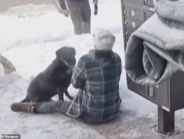 A woman, seen in a video claiming to be Good's wife, seemed to blame herself for the tragedy, saying she 'made her come down here' to the ICE protests