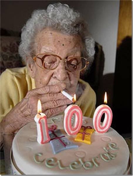 lighting-a-cigarette-off-a-100-cand.jpg
